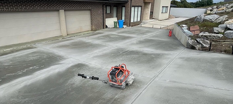 Sarasota cutting expansion cracks for a newly poured slab.