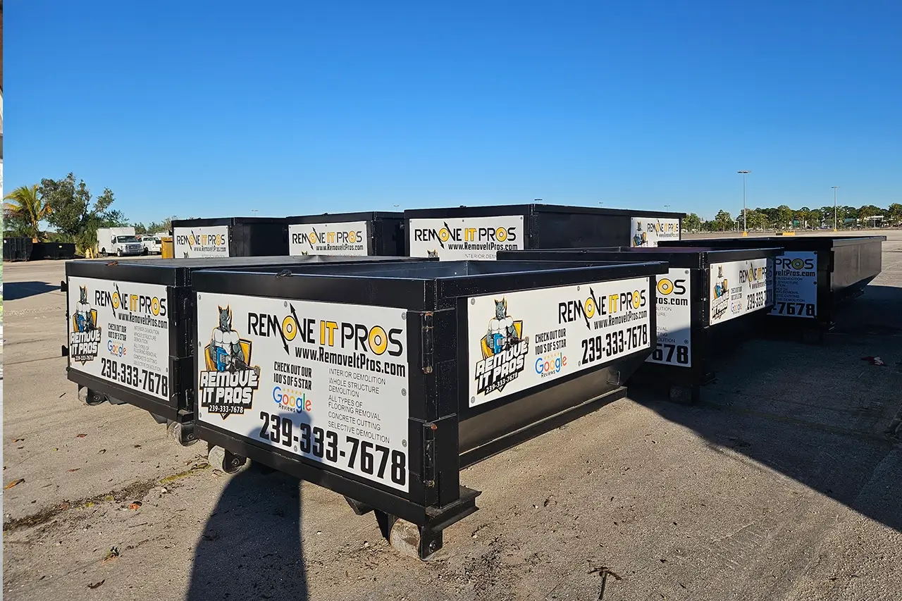 Remove It Pros branded dumpster rentals lined up and ready for delivery